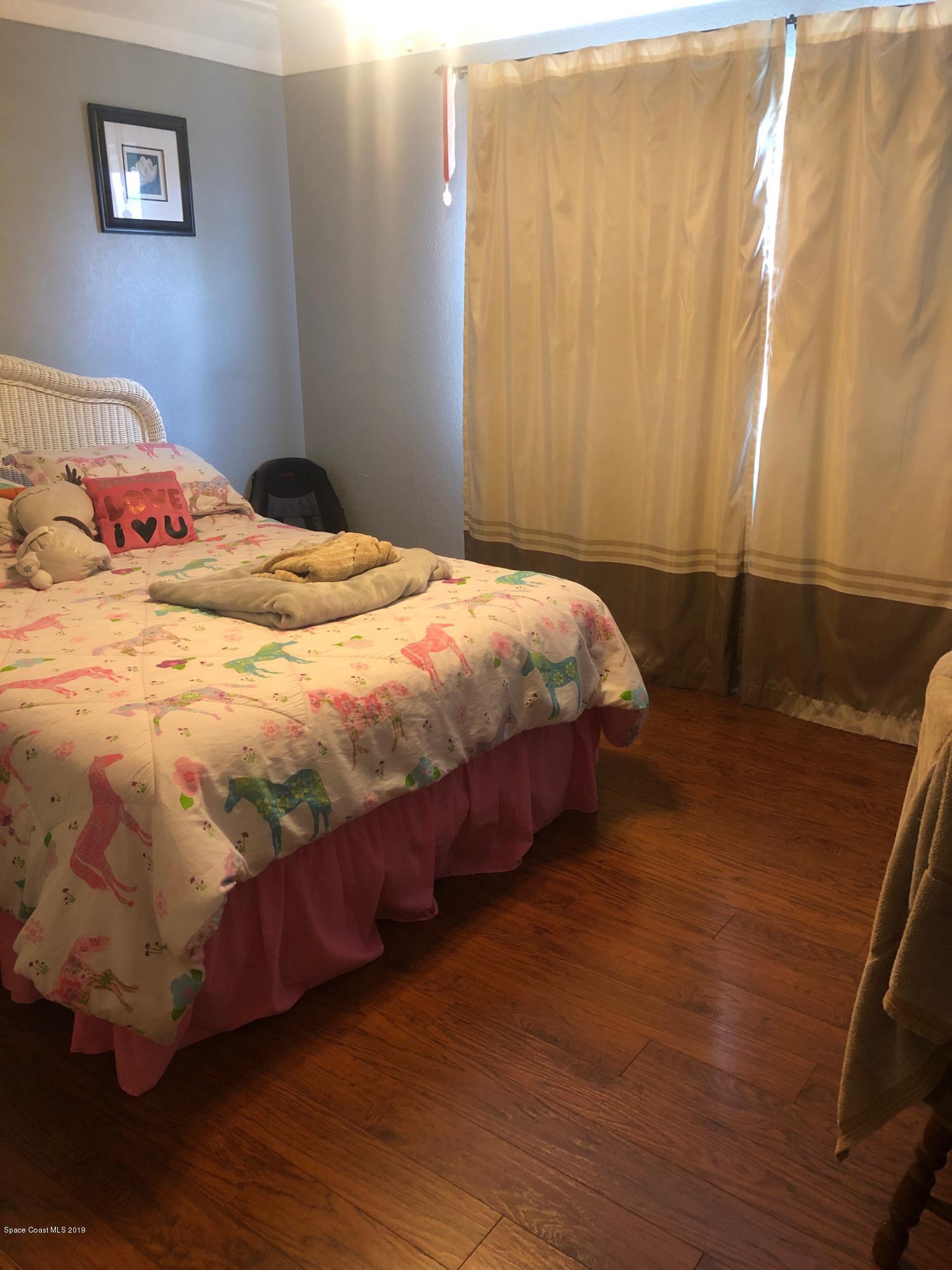4869 Sisson Road Titusville, FL 32780 - Photo 15 of 23 Bedroom 1