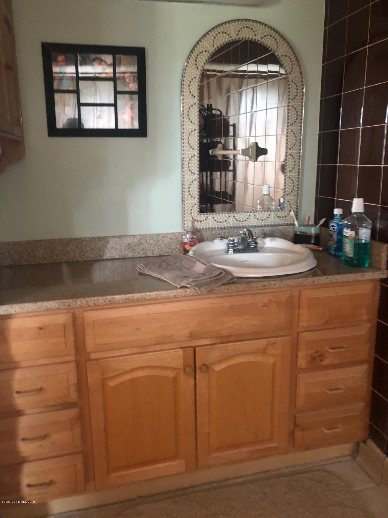 4869 Sisson Road Titusville, FL 32780 - Photo 19 of 23 Master bath
