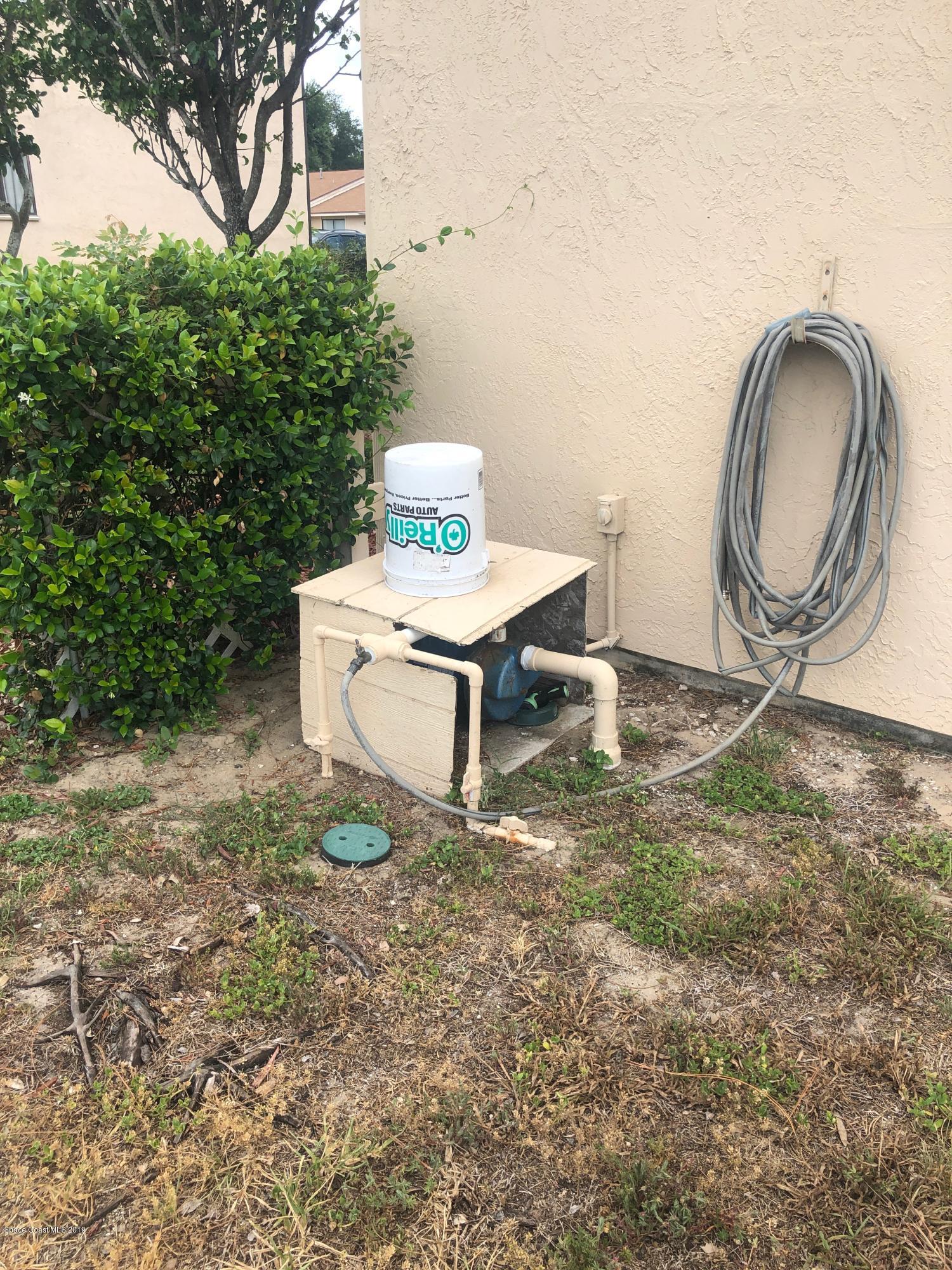 4869 Sisson Road Titusville, FL 32780 - Photo 23 of 23 Sprinkler pump