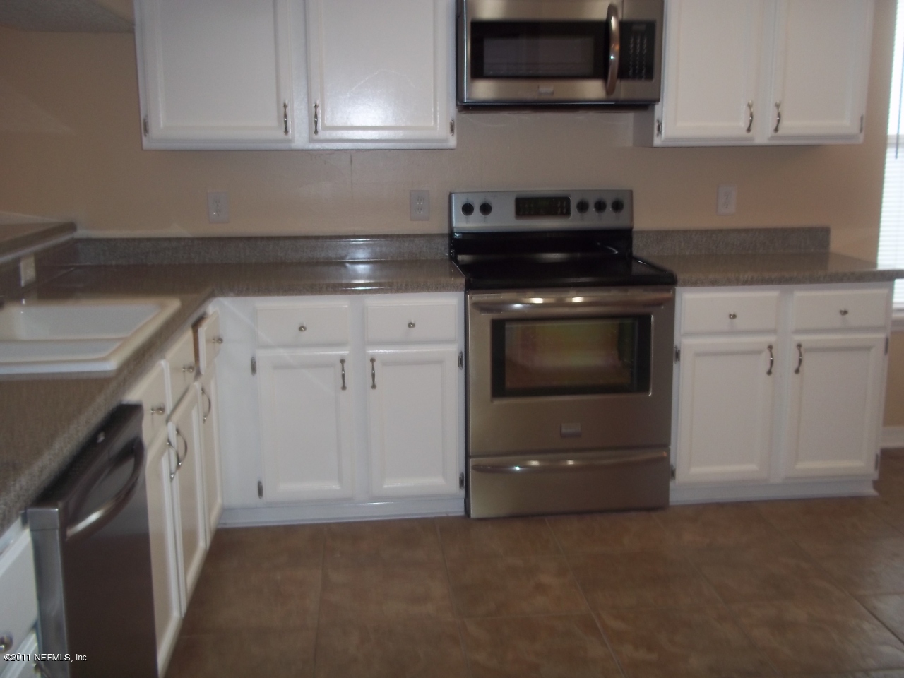 9105 Sable Ridge Court Jacksonville, FL 32244 - Photo 2 of 3 Kitchen/ LR
