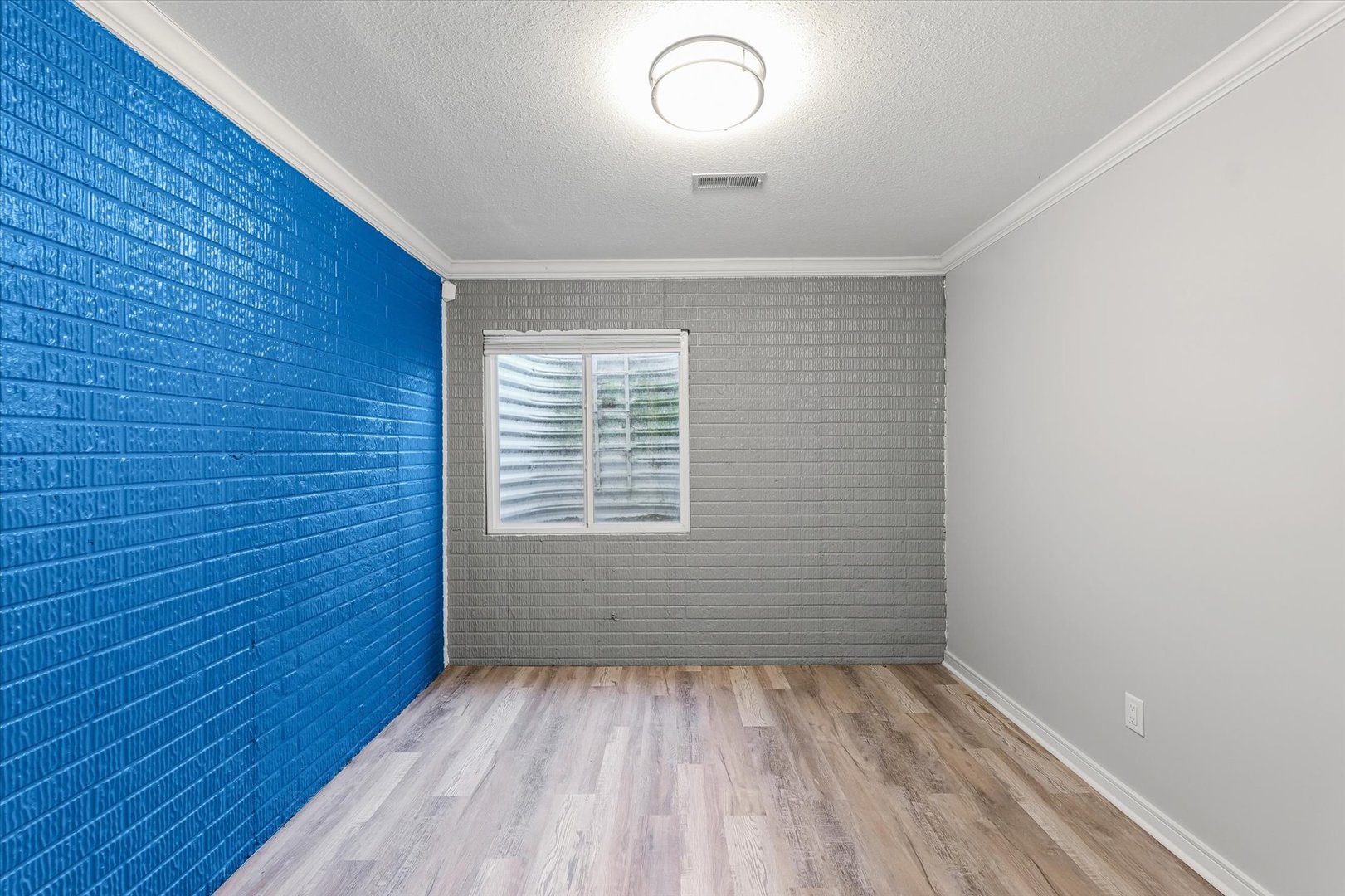 1424 Bluegrass Lane Champaign, IL 61822 - Photo 25 of 29 wooden floor in an empty room with a window