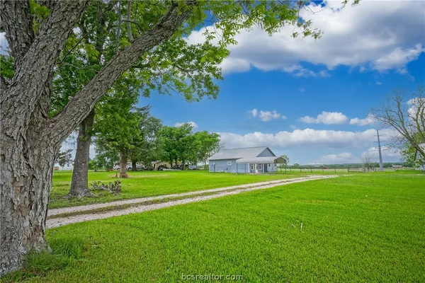 a view of a golf course with a garden