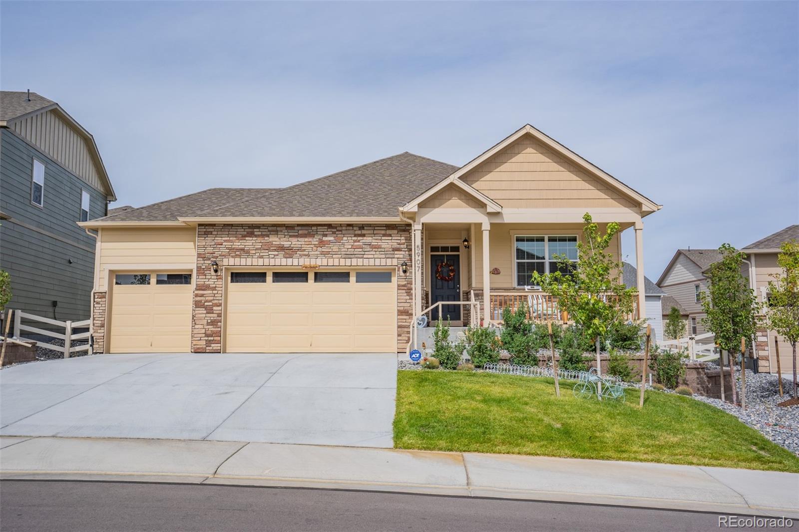 5907 Point Rider Circle Castle Rock, CO 80104 - Photo 1 of 29 a front view of a house with garden