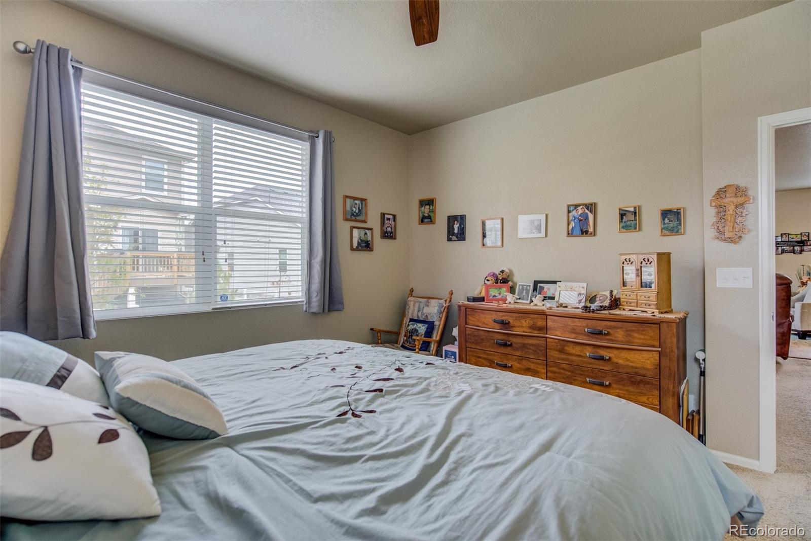 5907 Point Rider Circle Castle Rock, CO 80104 - Photo 15 of 29 a bed room with a bed and a window