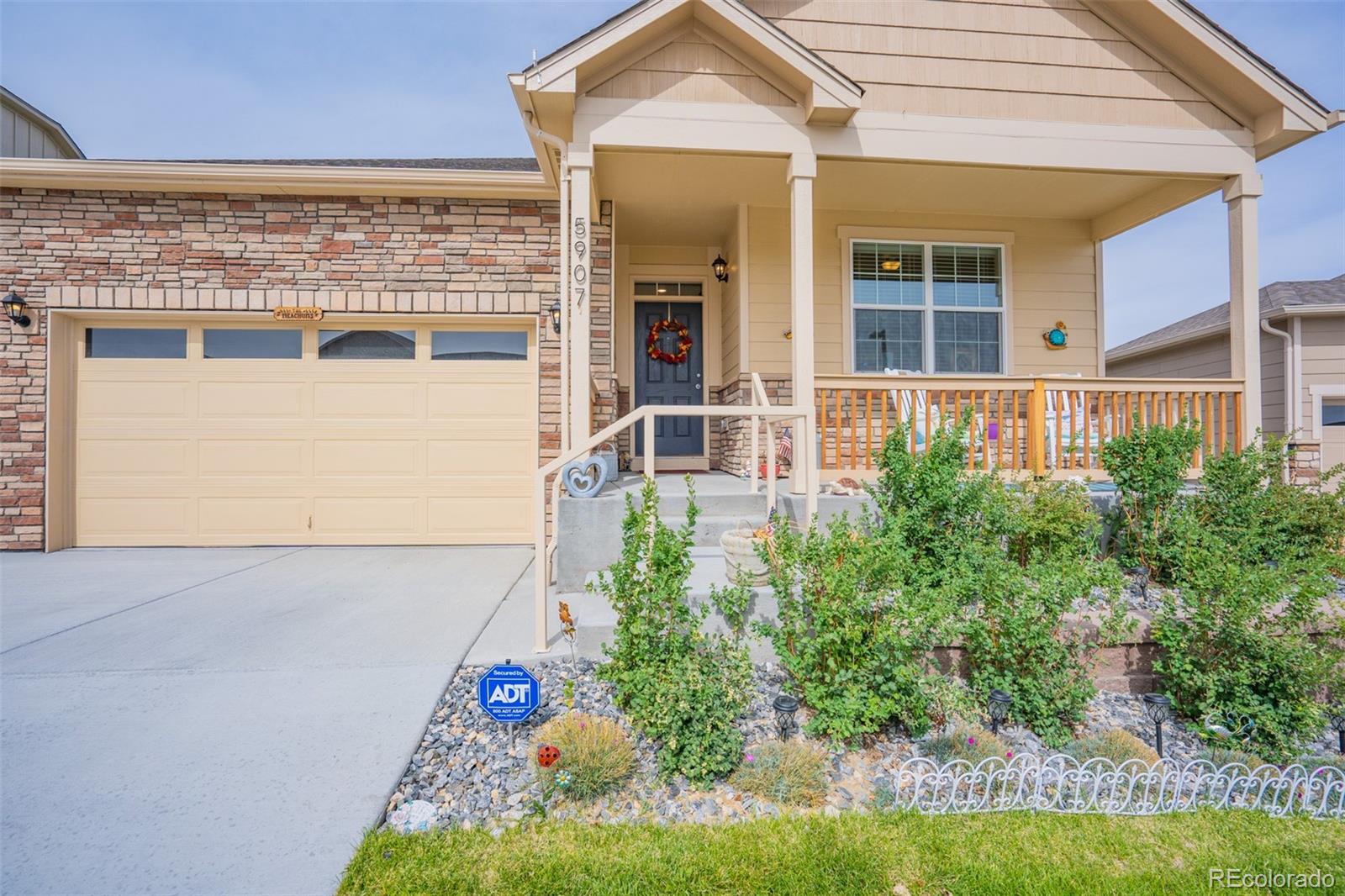 5907 Point Rider Circle Castle Rock, CO 80104 - Photo 2 of 29 front view of a house with a yard