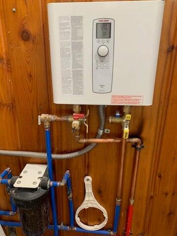 9319 Blue Horizon Road Presque Isle, MI 49777 - Photo 21 of 36 New saltless filtered water system installed and new water pump