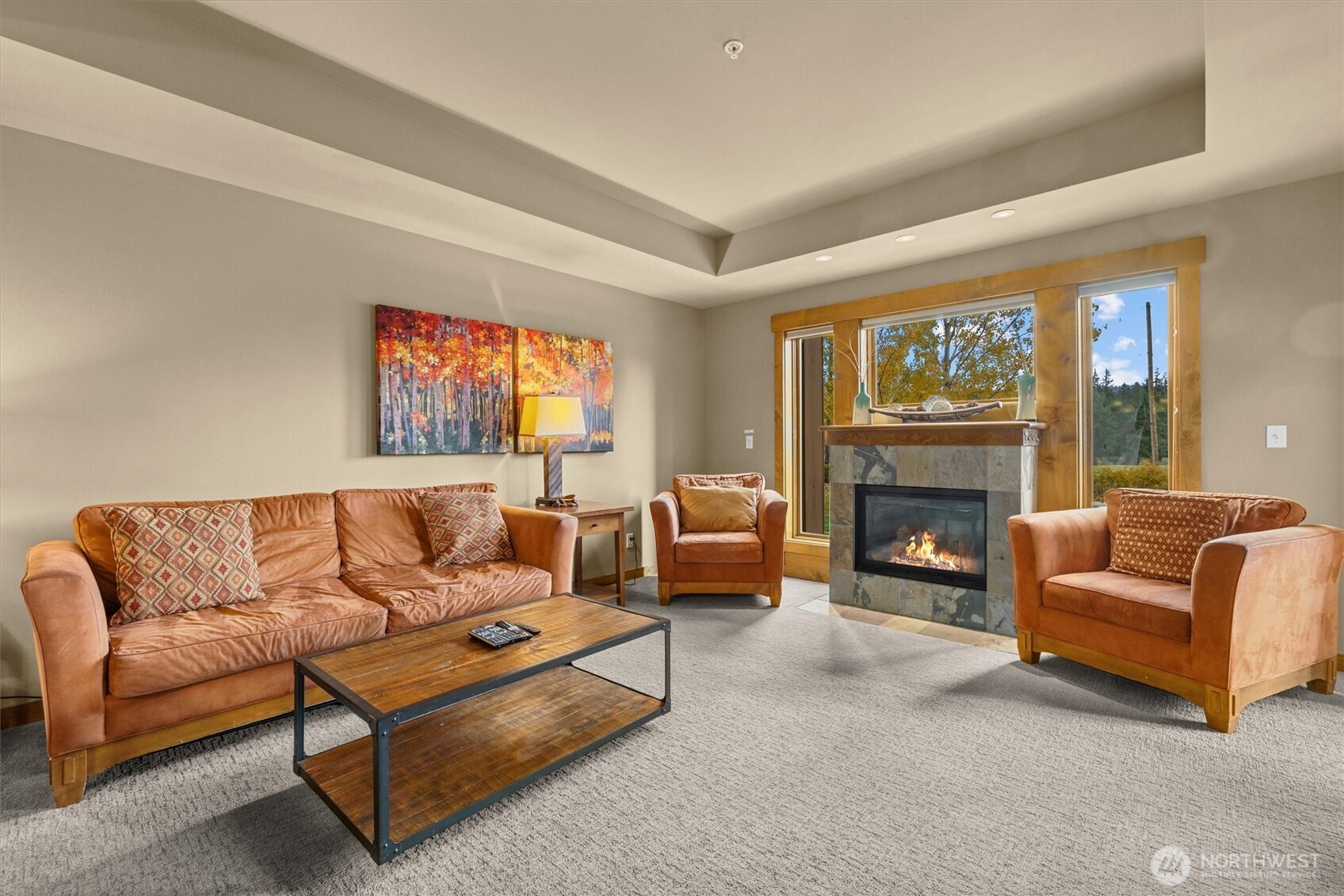 3770 Suncadia Trail, Unit 102 Cle Elum, WA 98922 - Photo 11 of 35 a living room with furniture and a fireplace
