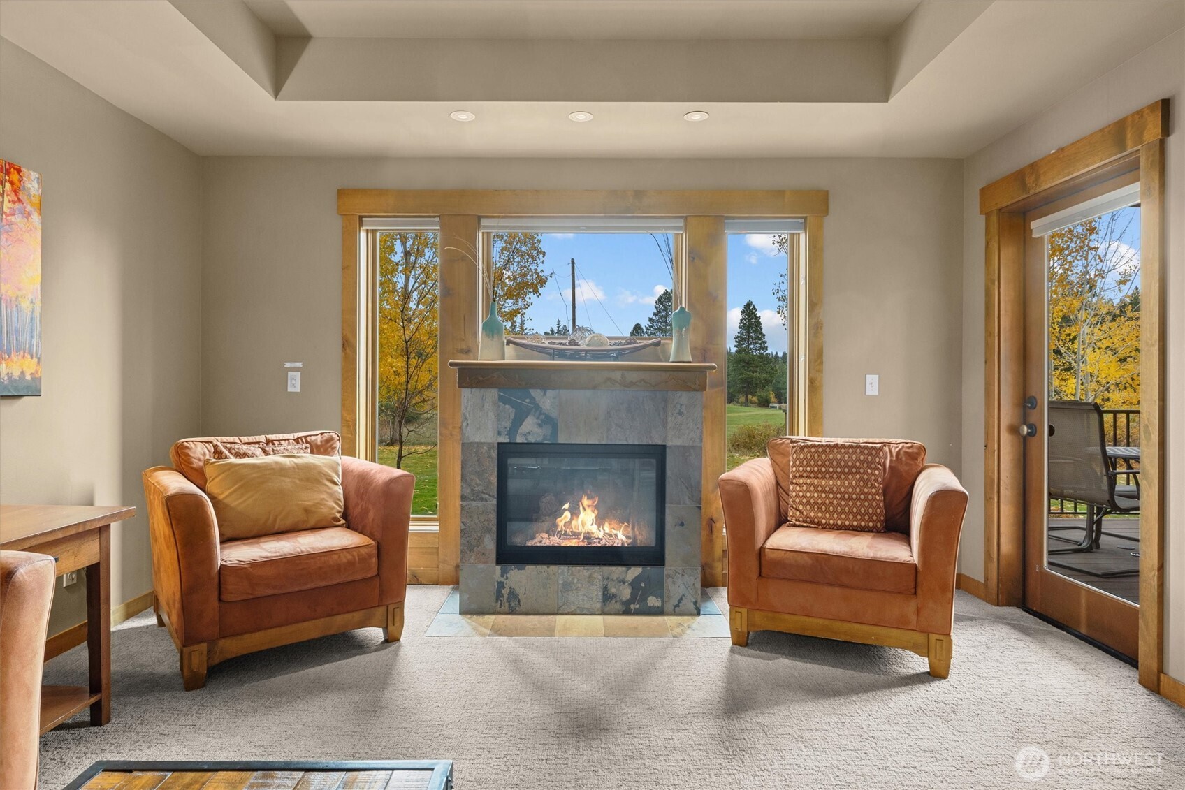 3770 Suncadia Trail, Unit 102 Cle Elum, WA 98922 - Photo 12 of 35 a living room with furniture and a fireplace