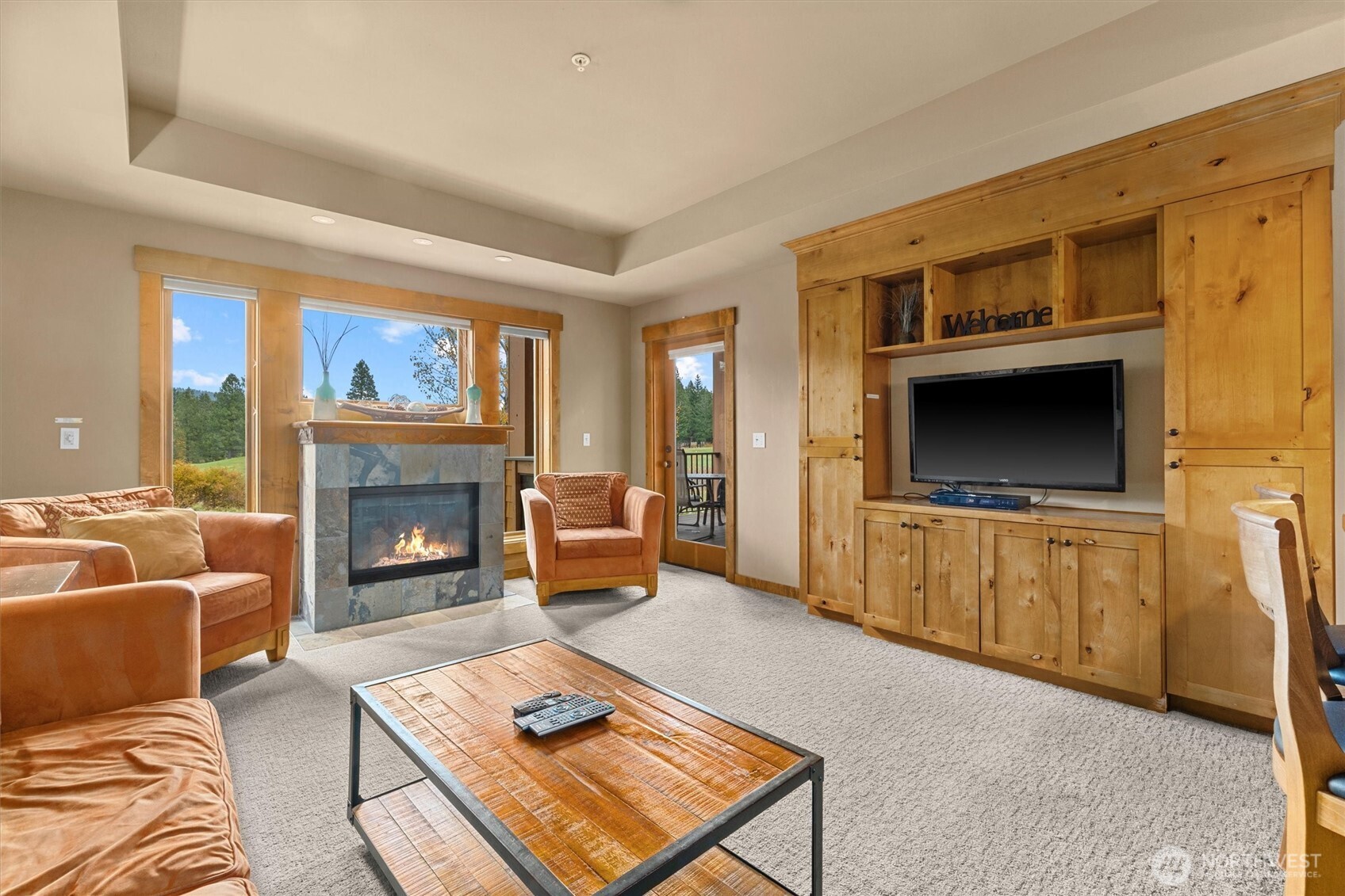 3770 Suncadia Trail, Unit 102 Cle Elum, WA 98922 - Photo 13 of 35 a living room with furniture and a fireplace