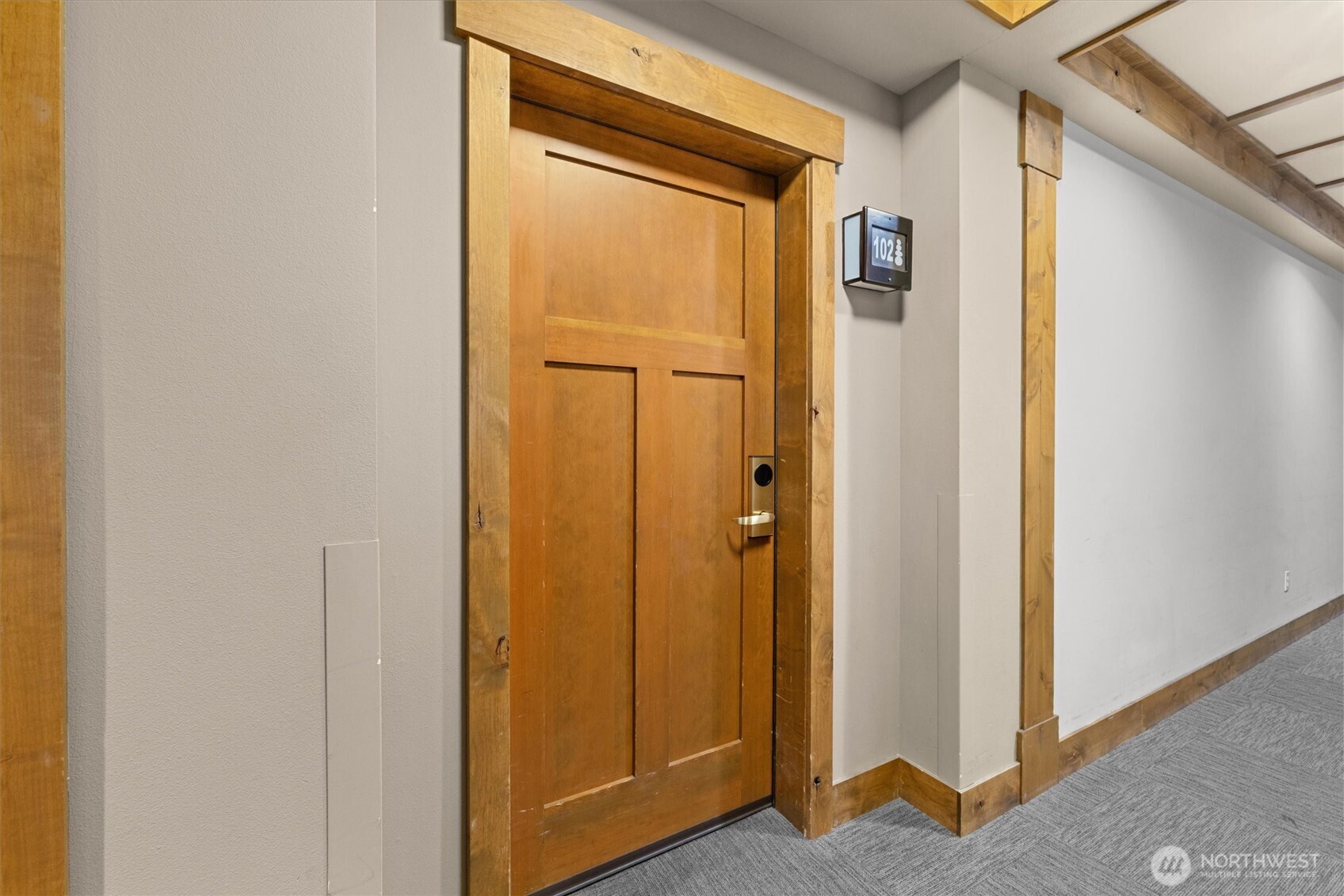 3770 Suncadia Trail, Unit 102 Cle Elum, WA 98922 - Photo 2 of 35 a view of a hallway with wooden floor