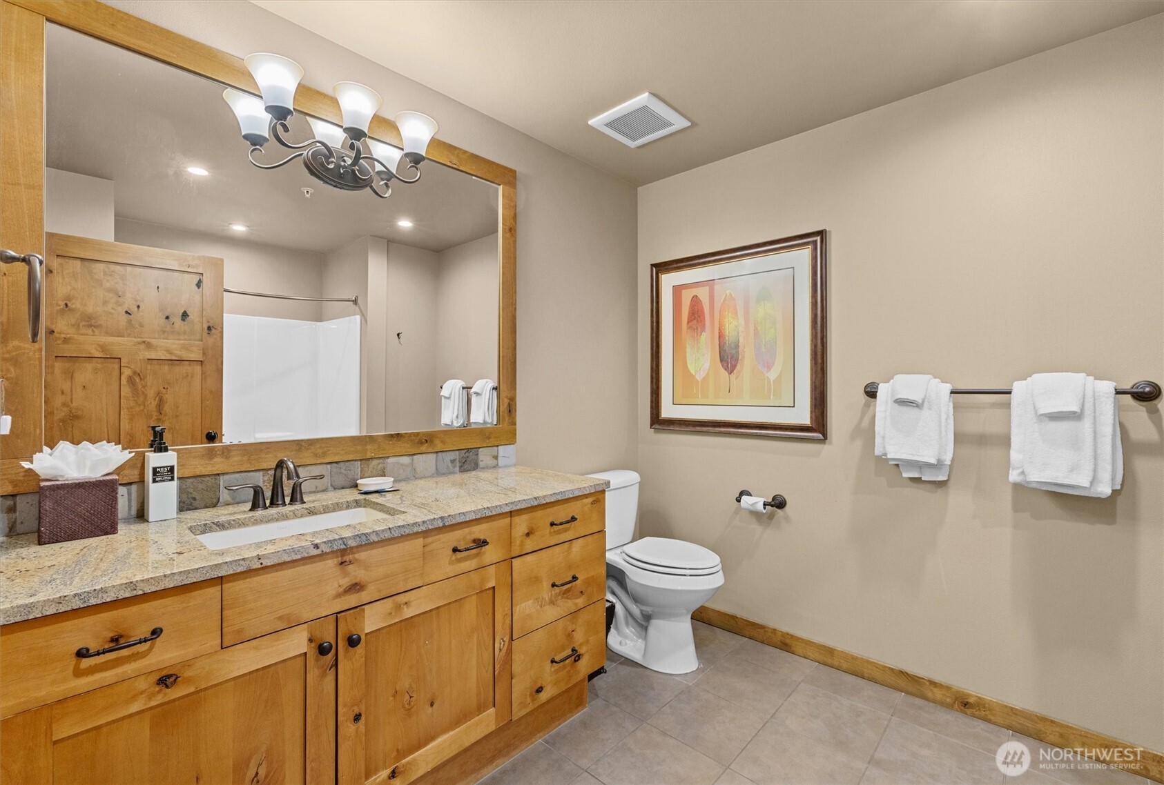 3770 Suncadia Trail, Unit 102 Cle Elum, WA 98922 - Photo 26 of 35 a bathroom with a toilet sink and mirror