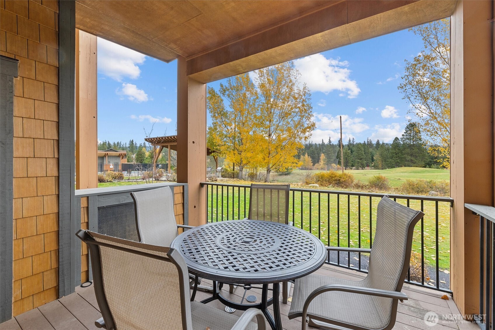 3770 Suncadia Trail, Unit 102 Cle Elum, WA 98922 - Photo 30 of 35 a view of a chairs and table in the balcony