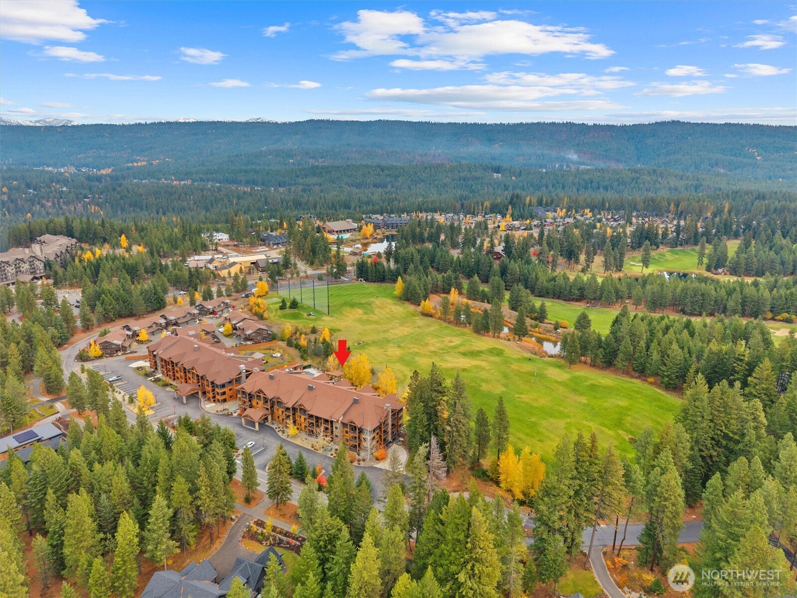 3770 Suncadia Trail, Unit 102 Cle Elum, WA 98922 - Photo 35 of 35 a view of a lake with a yard