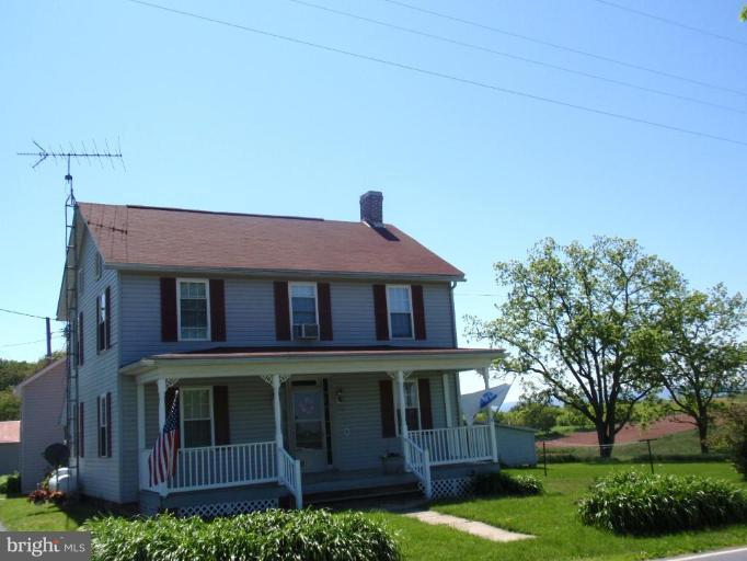 11629 Haughs Church Road Keymar, MD 21757 - Photo 1 of 11 front view of a house with a yard