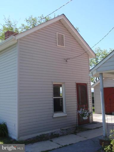 11629 Haughs Church Road Keymar, MD 21757 - Photo 11 of 11 a front view of a house with patio