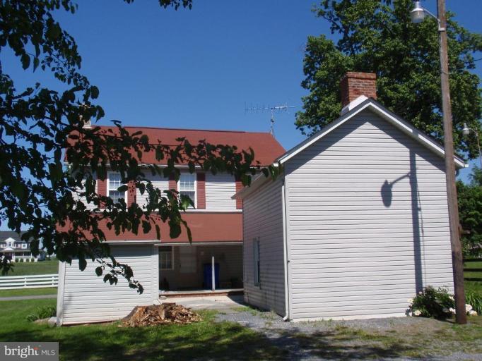 11629 Haughs Church Road Keymar, MD 21757 - Photo 5 of 11 a front view of a house with a yard