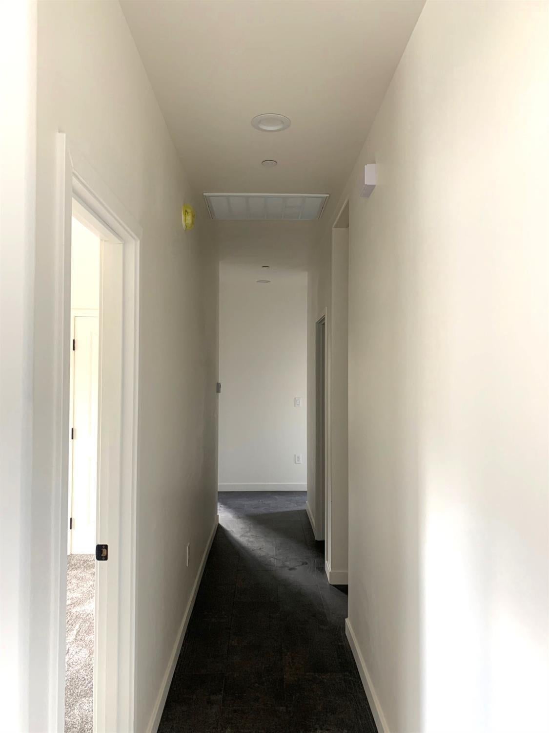 20901 Quail Springs Road Tehachapi, CA 93561 - Photo 7 of 28 Hallway to bedrooms, laundry room & garage