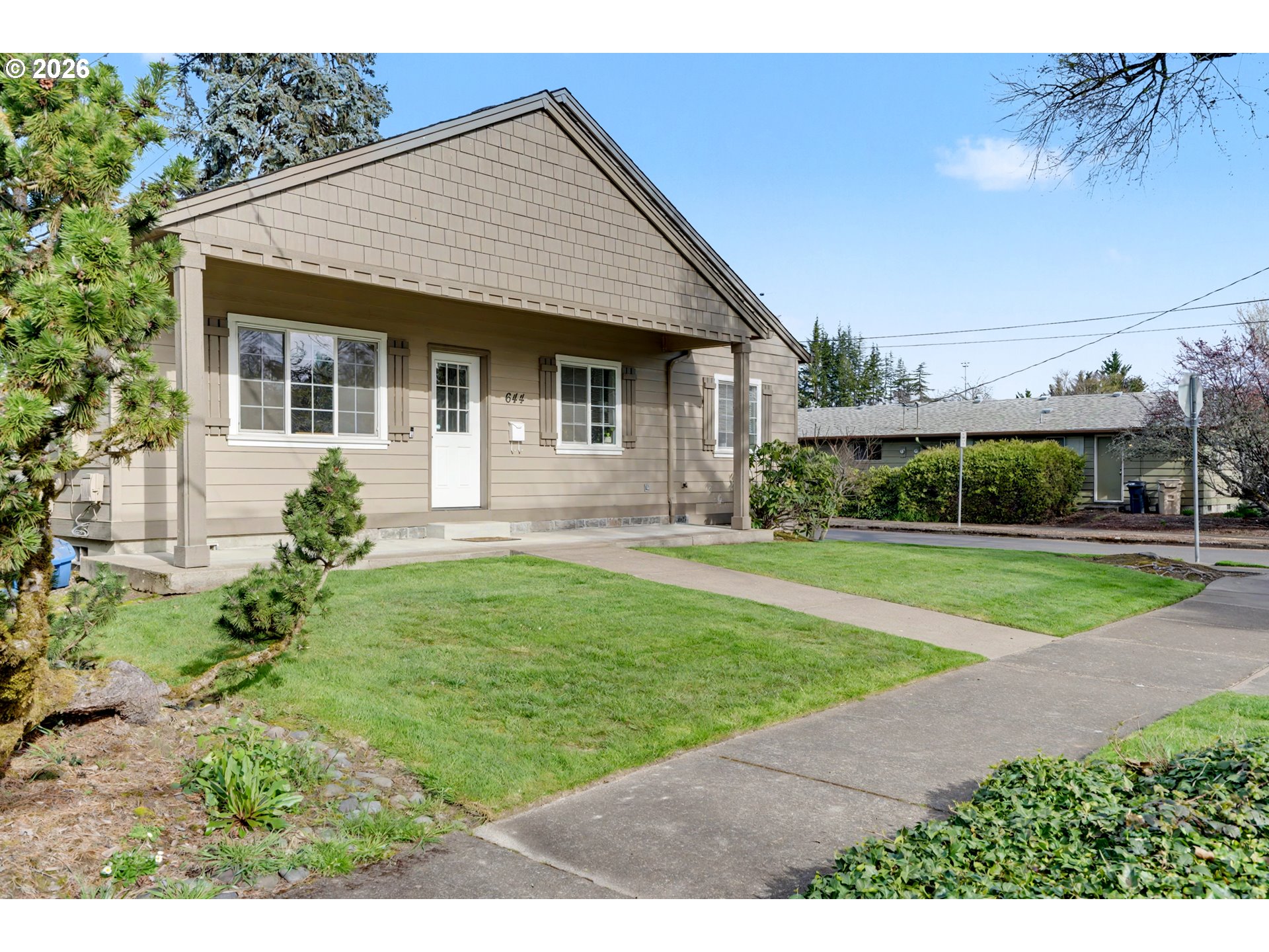 644 Northwest 14th Street Corvallis, OR 97330 - Photo 4 of 23 a view of a house with a yard