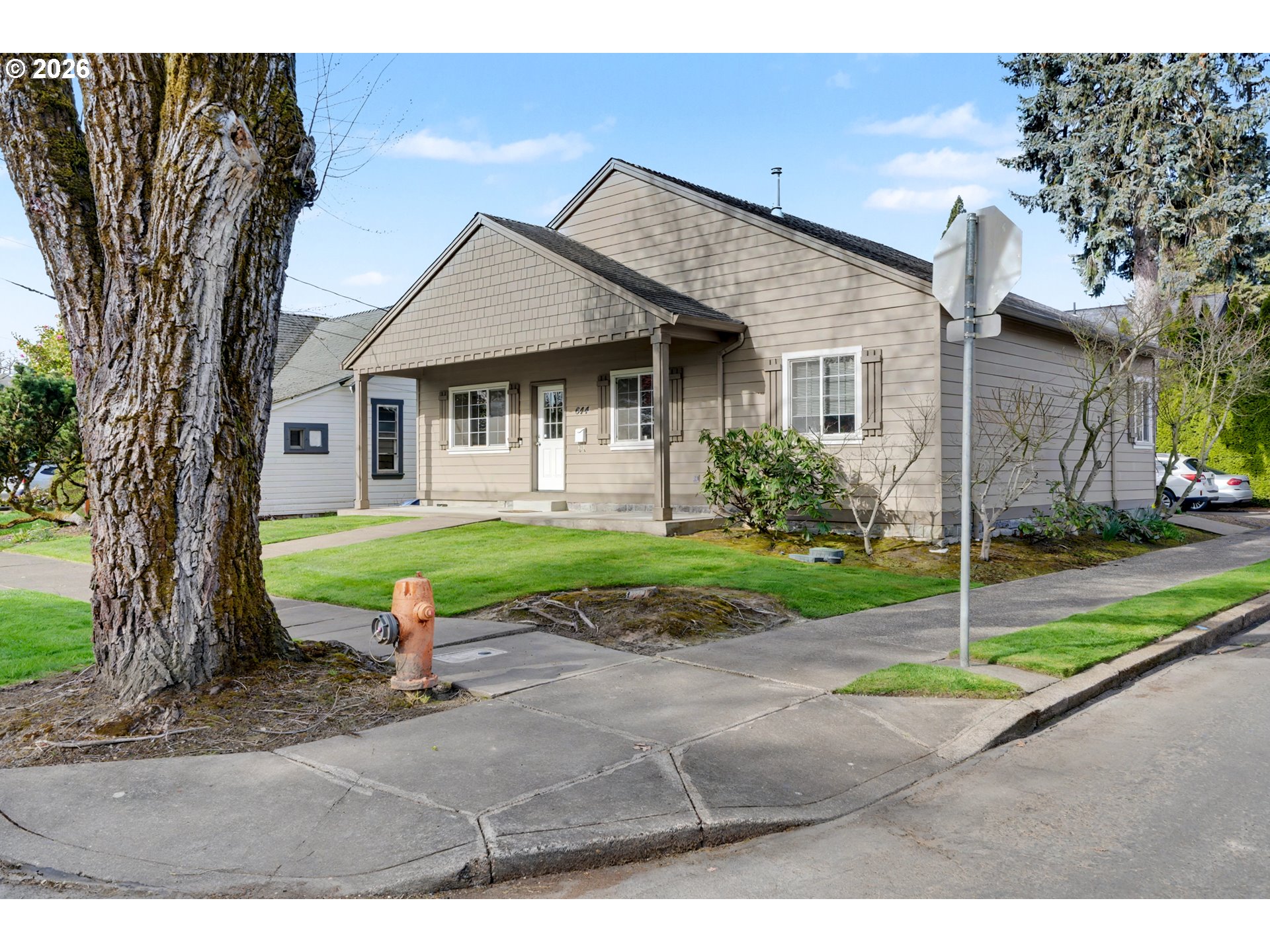 644 Northwest 14th Street Corvallis, OR 97330 - Photo 6 of 23 a view of a house with backyard and a tree
