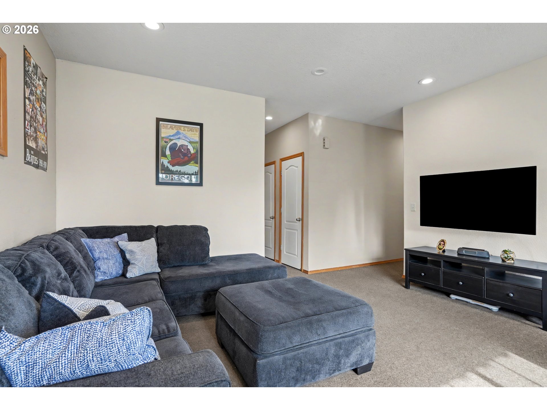 644 Northwest 14th Street Corvallis, OR 97330 - Photo 10 of 23 a living room with furniture and a flat screen tv