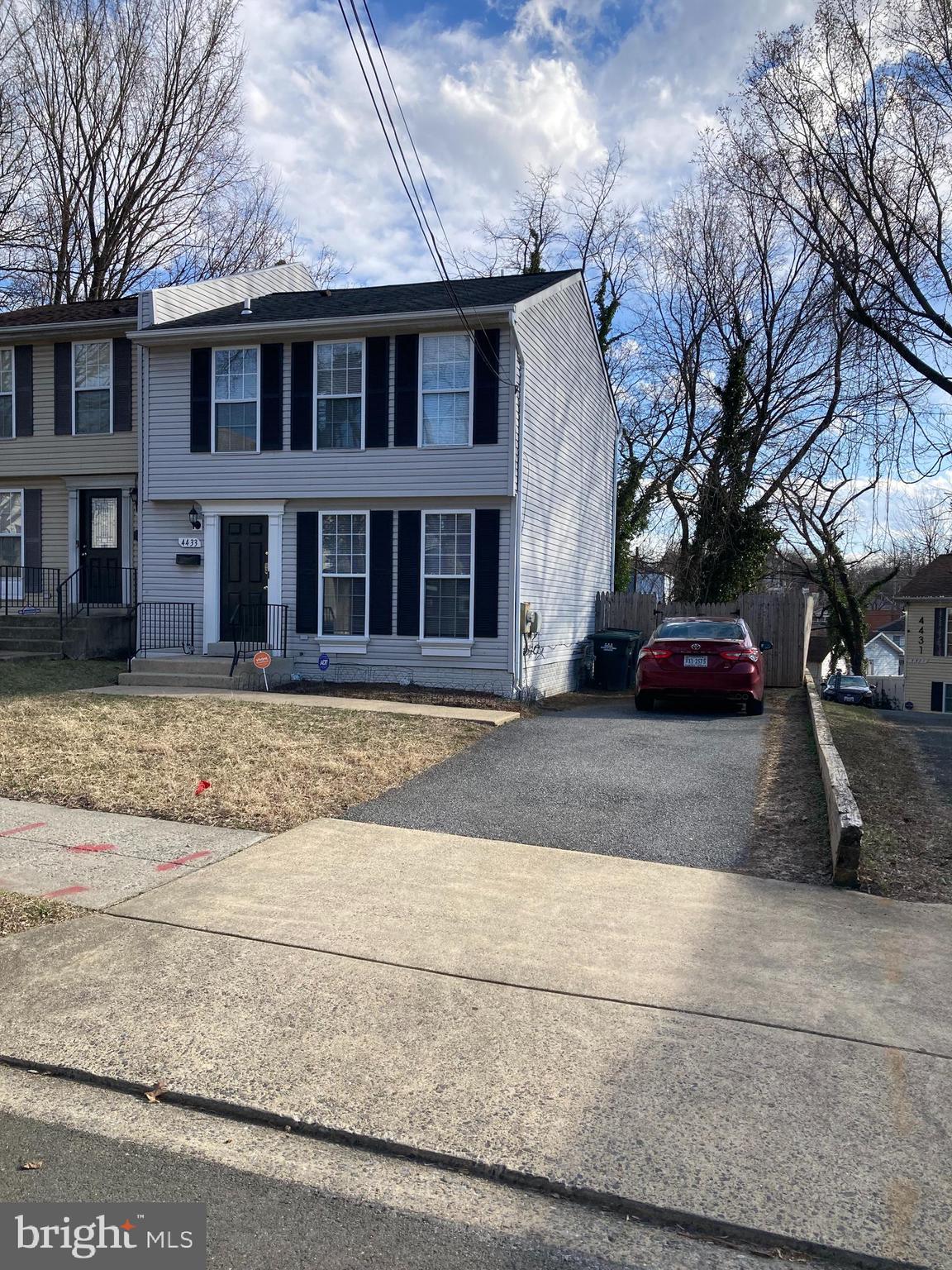 4433 Hunt Place Northeast Washington, DC 20019 - Photo 1 of 25 a view of a car parked on the side of the road