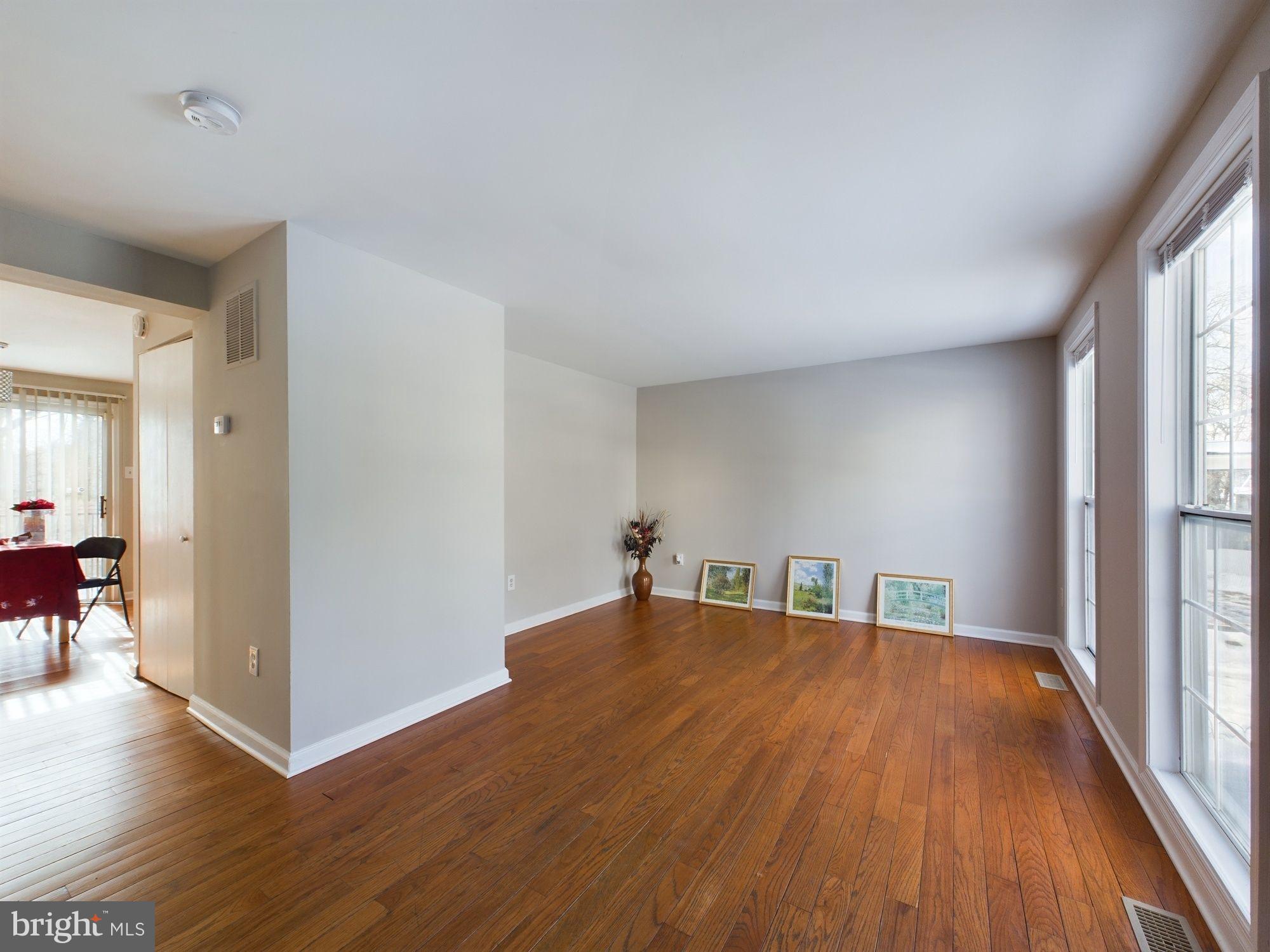 4433 Hunt Place Northeast Washington, DC 20019 - Photo 3 of 25 a view of a livingroom with wooden floor