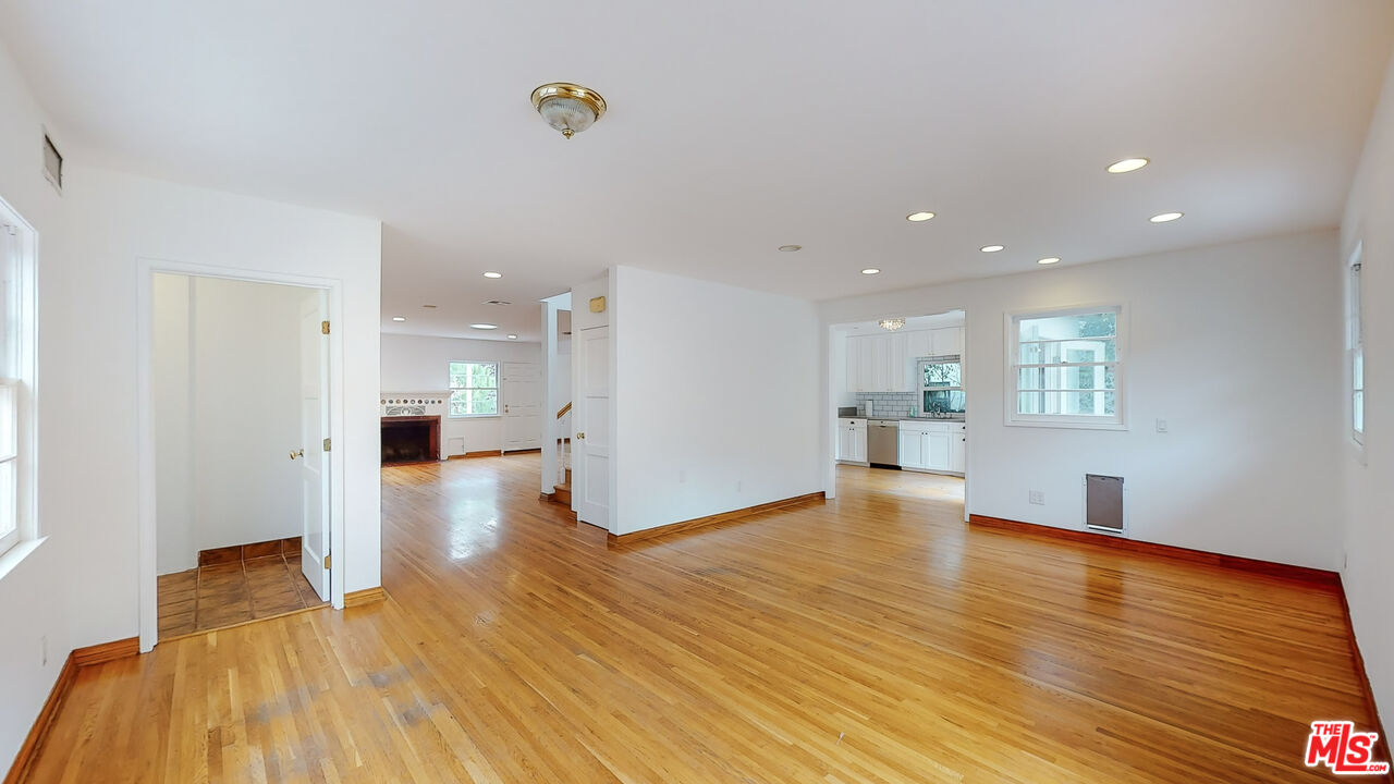 365 Sycamore Road Santa Monica, CA 90402 - Photo 15 of 42 a view of empty room with wooden floor