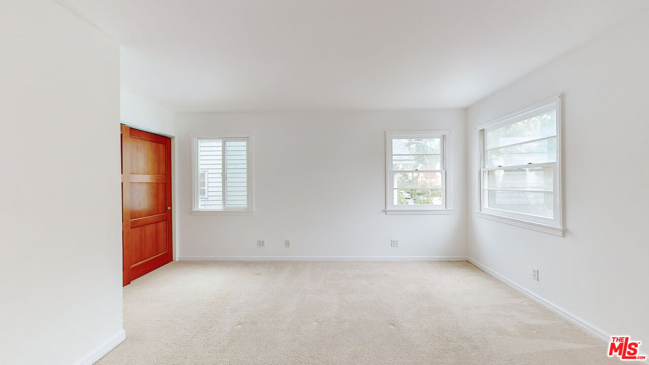 365 Sycamore Road Santa Monica, CA 90402 - Photo 17 of 42 an empty room with windows