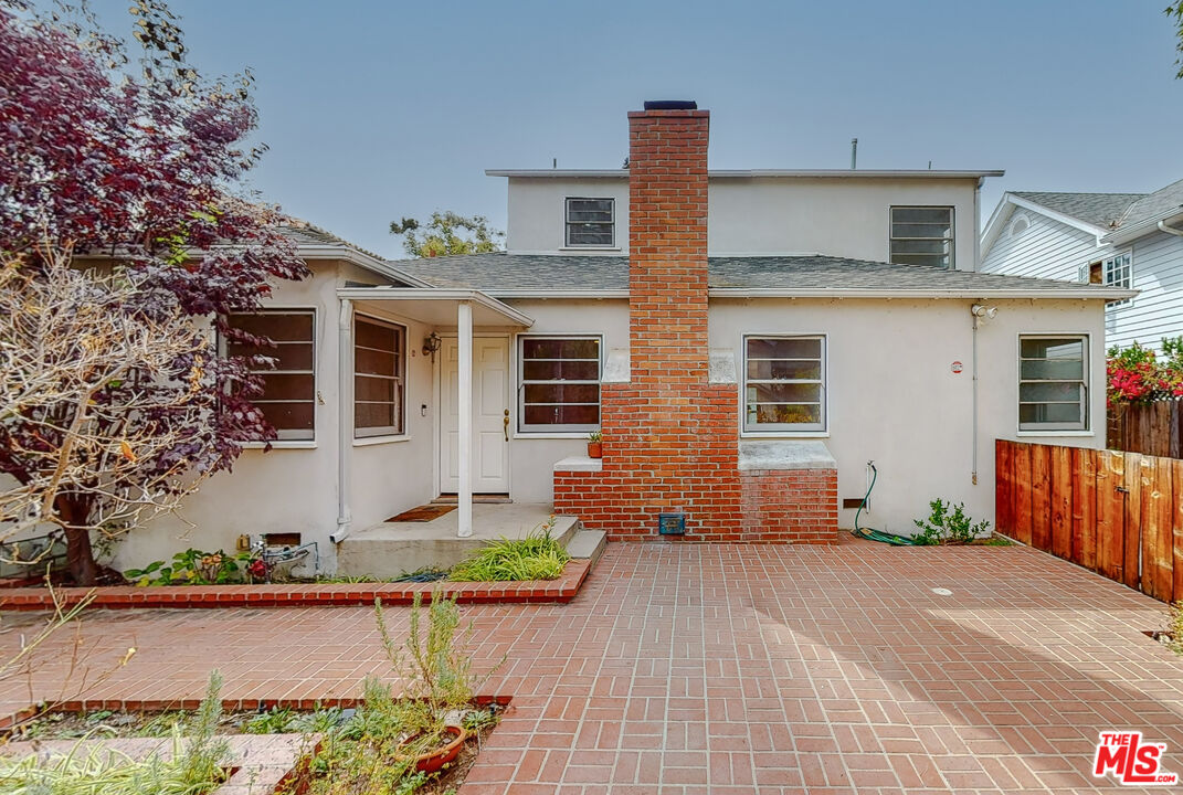 365 Sycamore Road Santa Monica, CA 90402 - Photo 2 of 42 front view of a house with a patio