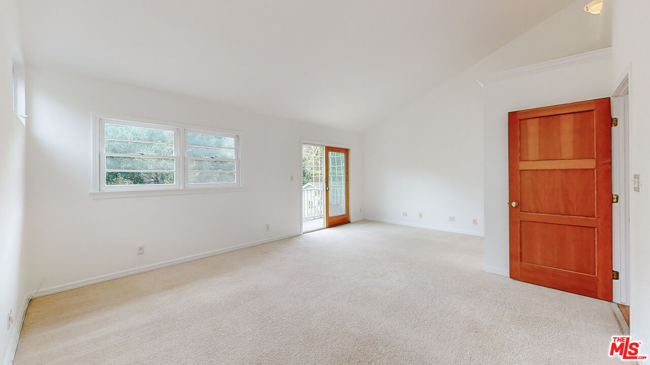 365 Sycamore Road Santa Monica, CA 90402 - Photo 23 of 42 an empty room with windows