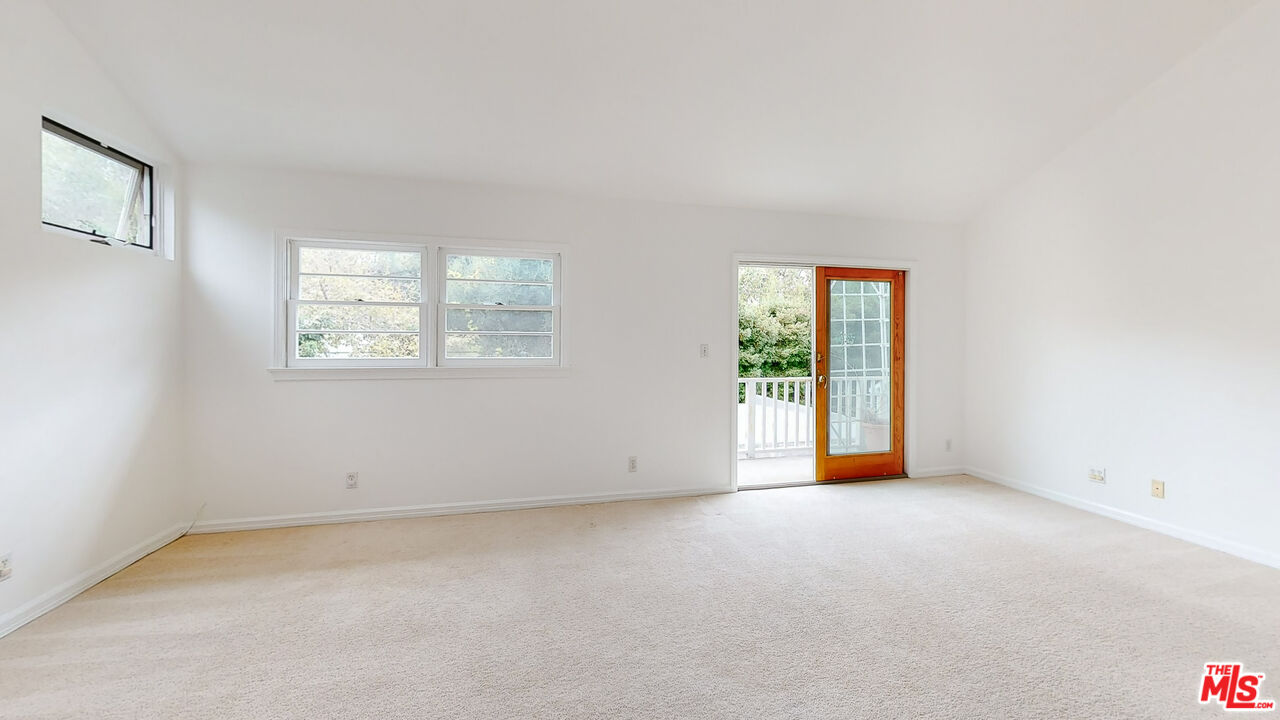 365 Sycamore Road Santa Monica, CA 90402 - Photo 26 of 42 an empty room with windows