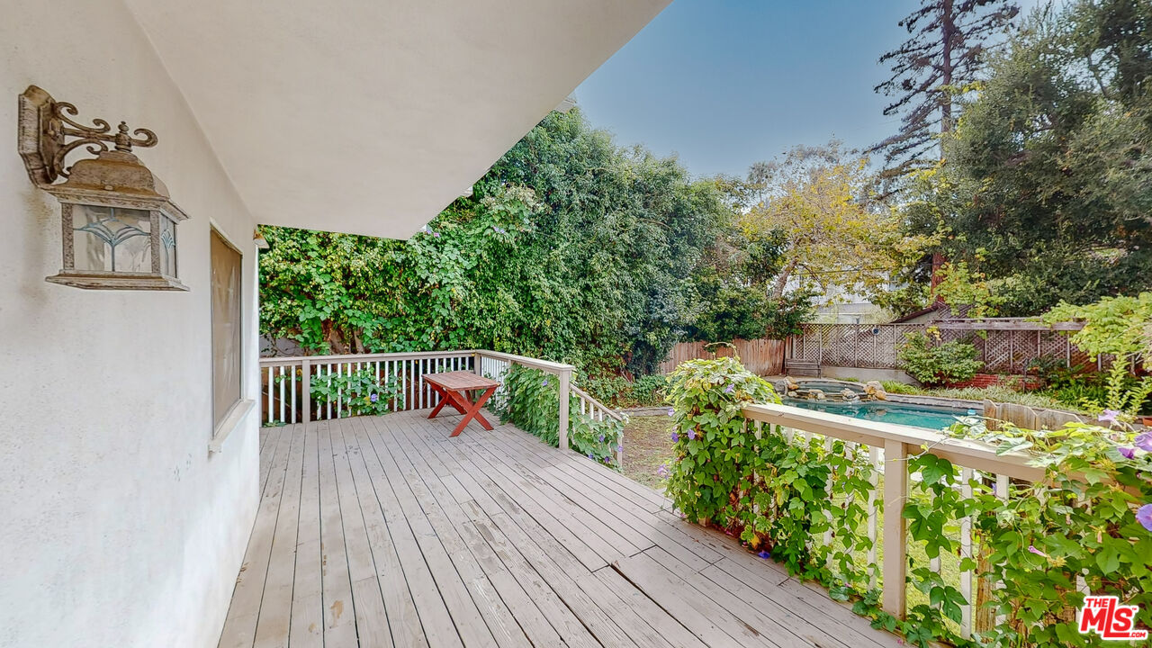 365 Sycamore Road Santa Monica, CA 90402 - Photo 33 of 42 a balcony with wooden floor