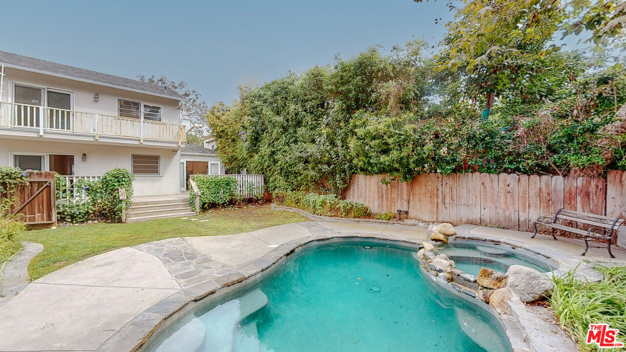 365 Sycamore Road Santa Monica, CA 90402 - Photo 36 of 42 a house with swimming pool in front of it