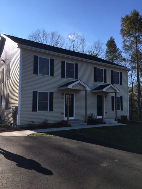 163 Leesville Road Moodus, CT 06469 - Photo 1 of 1 a front view of a house with a yard