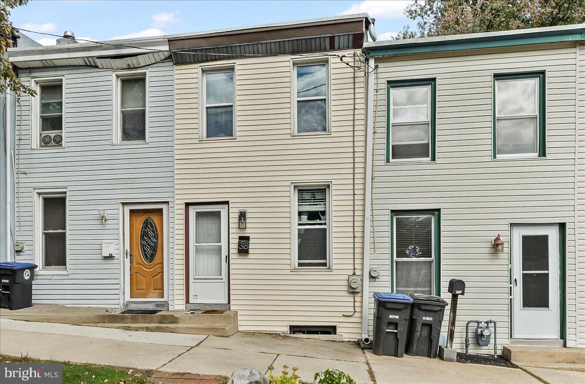 318 East 6th Avenue Conshohocken, PA 19428 - Photo 2 of 17 a view of a house with more windows and brick wall