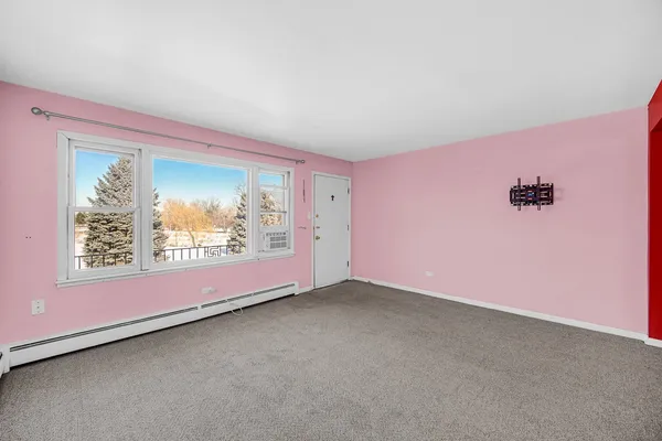 a view of a big room with window