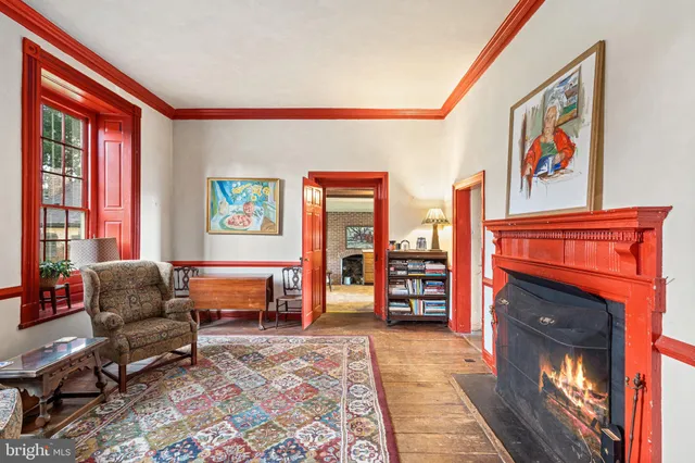a front view of a house with a yard table and chairs