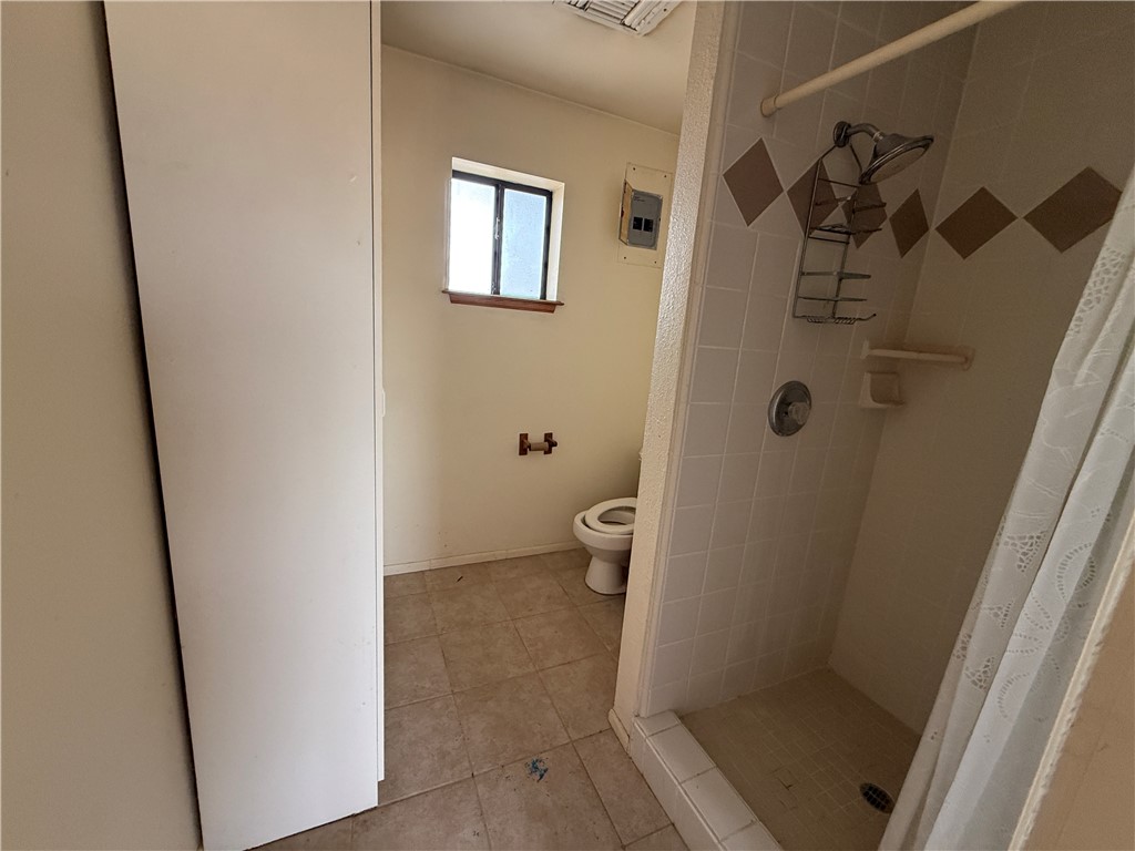 3443 3rd Street Inyokern, CA 93527 - Photo 15 of 25 a bathroom with a toilet and a shower