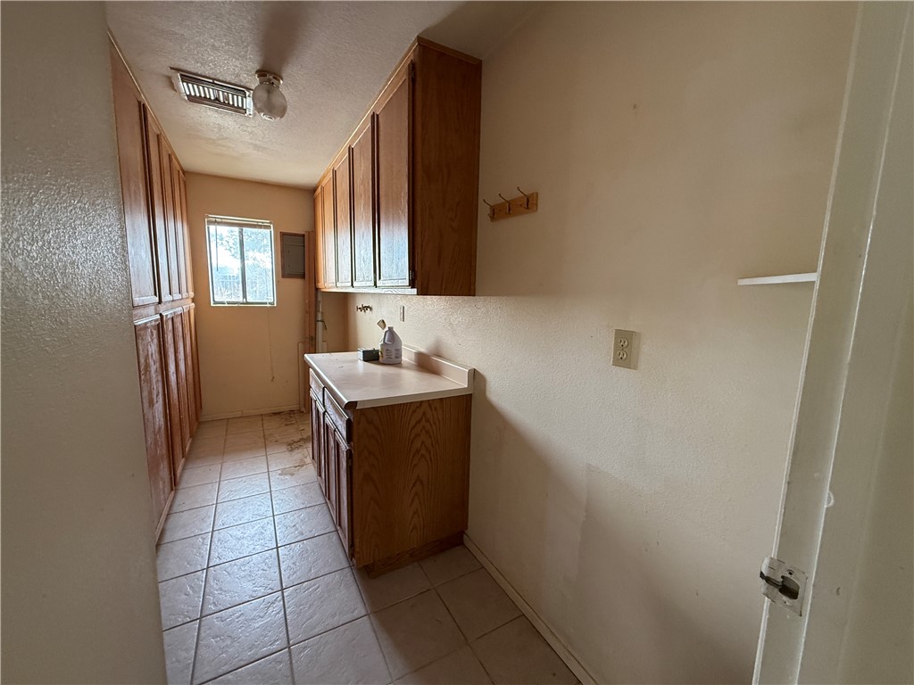 3443 3rd Street Inyokern, CA 93527 - Photo 17 of 25 a room with washing machine
