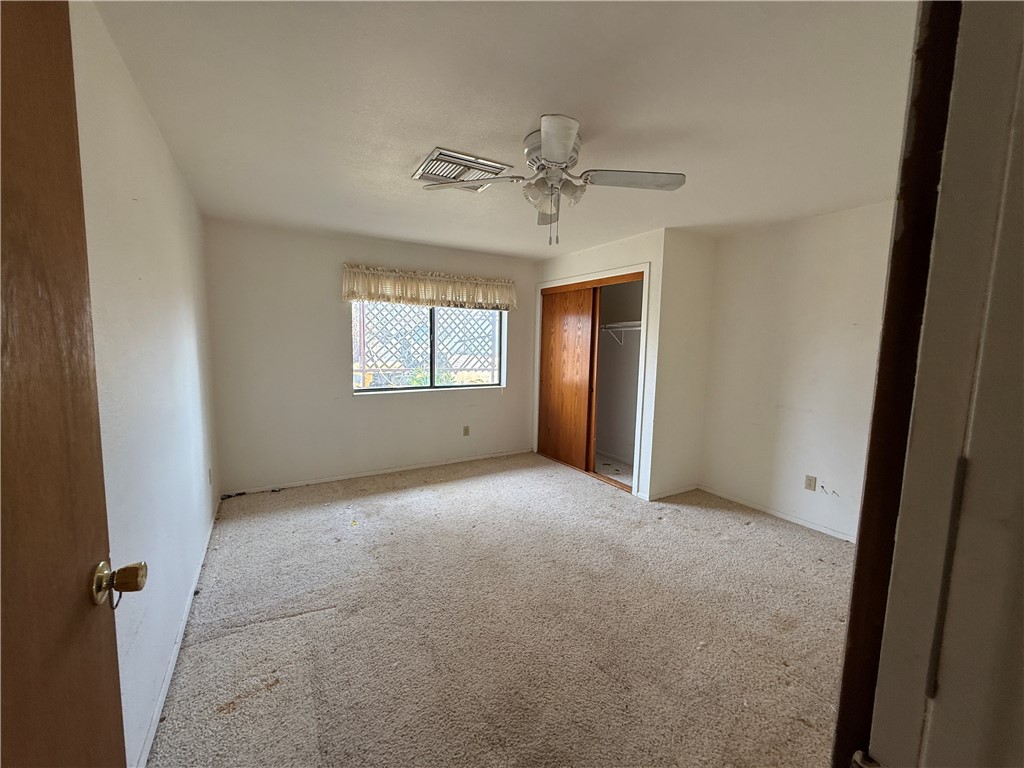 3443 3rd Street Inyokern, CA 93527 - Photo 18 of 25 an empty room with windows and fan