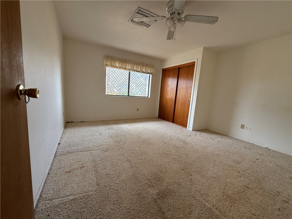 3443 3rd Street Inyokern, CA 93527 - Photo 20 of 25 an empty room with windows and fan