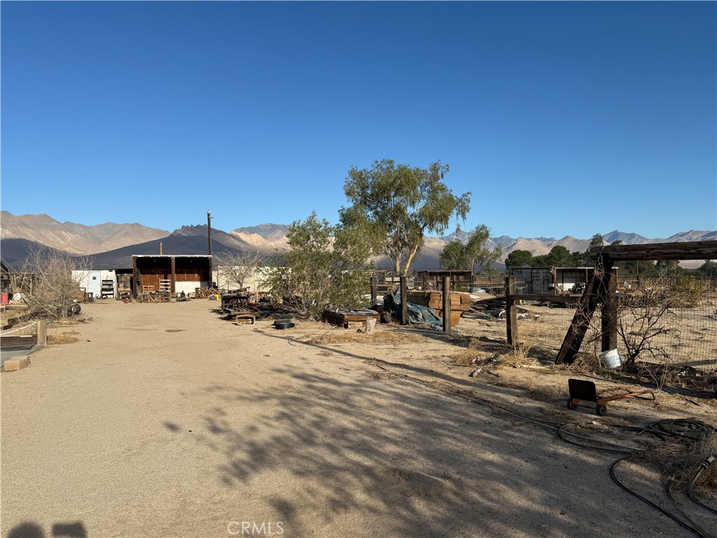 3443 3rd Street Inyokern, CA 93527 - Photo 3 of 25 a view of a road with a building in the background