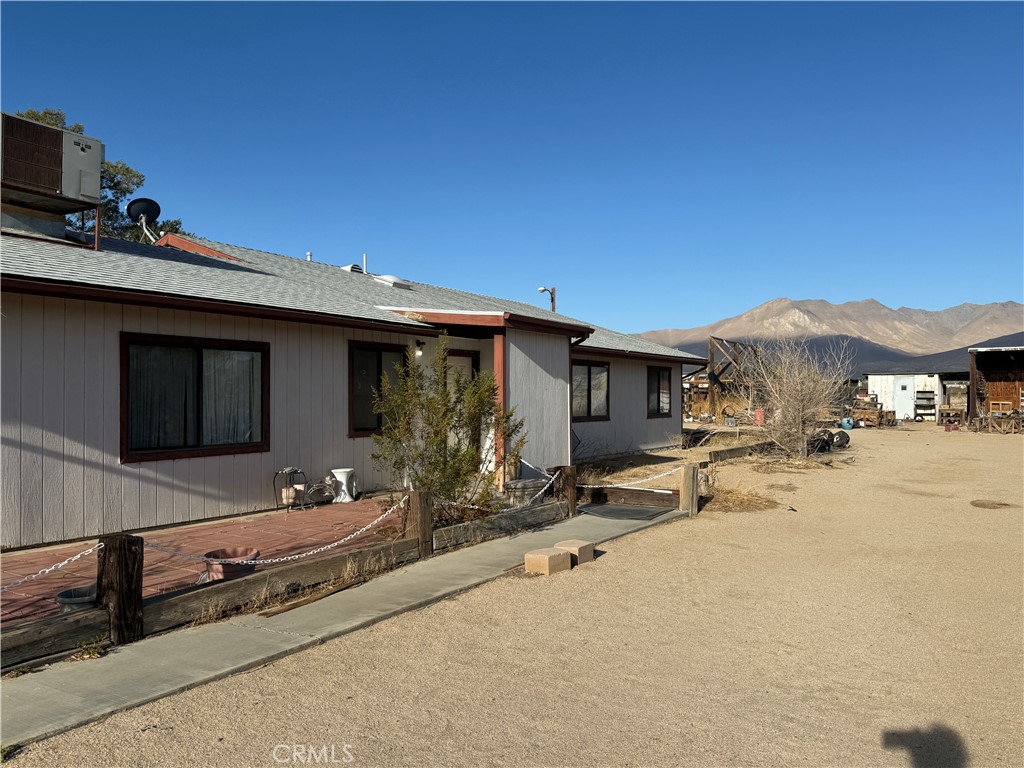 3443 3rd Street Inyokern, CA 93527 - Photo 4 of 25 a garage with table and chairs