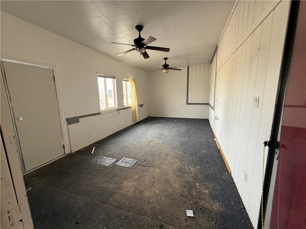3443 3rd Street Inyokern, CA 93527 - Photo 9 of 25 wooden floor in an empty room with a window