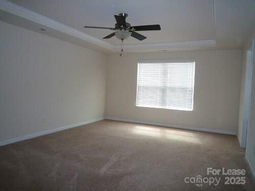 1003 Blue Stream Lane Indian Trail, NC 28079 - Photo 11 of 18 an empty room with a window and a ceiling fan