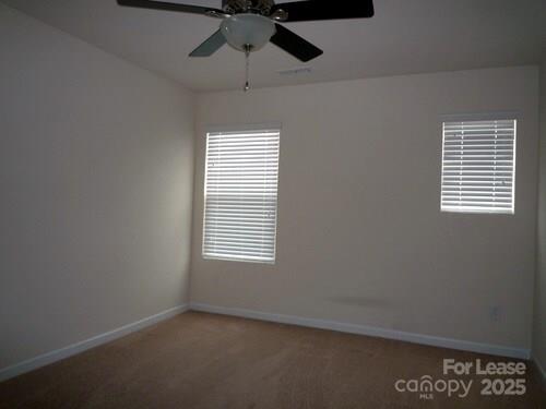 1003 Blue Stream Lane Indian Trail, NC 28079 - Photo 12 of 18 a view of an empty room with a window