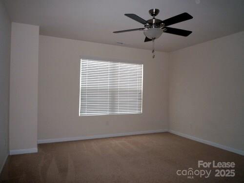 1003 Blue Stream Lane Indian Trail, NC 28079 - Photo 13 of 18 a view of an empty room with a window