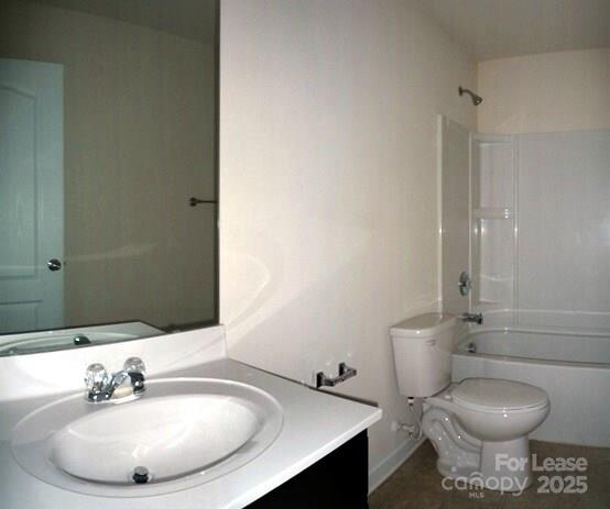 1003 Blue Stream Lane Indian Trail, NC 28079 - Photo 14 of 18 a bathroom with a sink toilet and a mirror