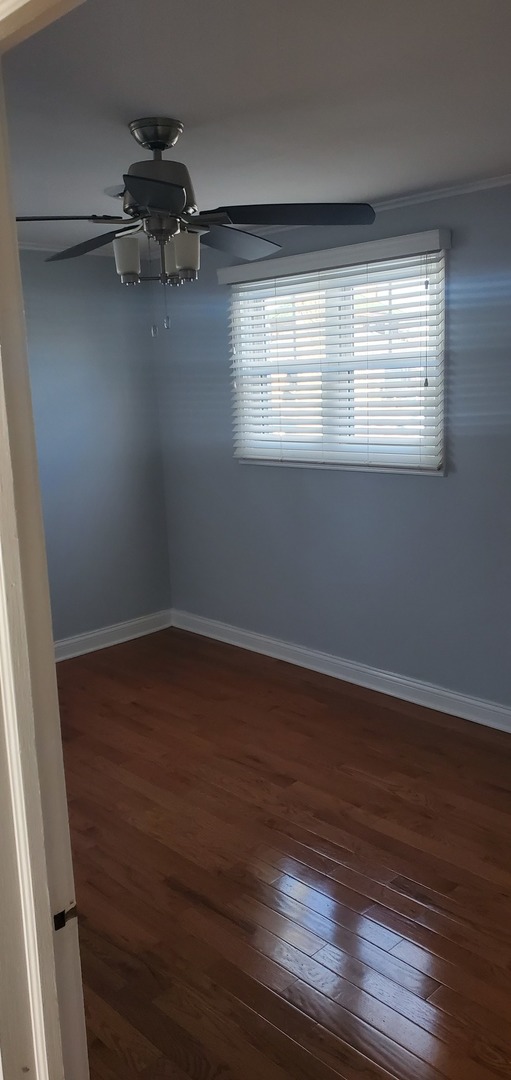 2049 Magnolia Road Homewood, IL 60430 - Photo 9 of 10 a view of a room with wooden floors and cabinet