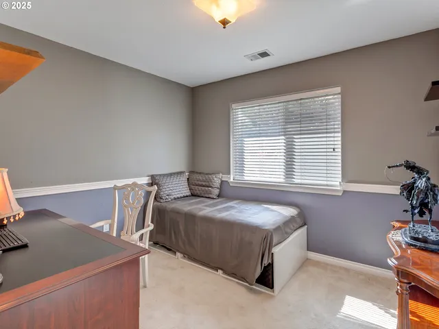 a bathroom with a sink toilet and a mirror